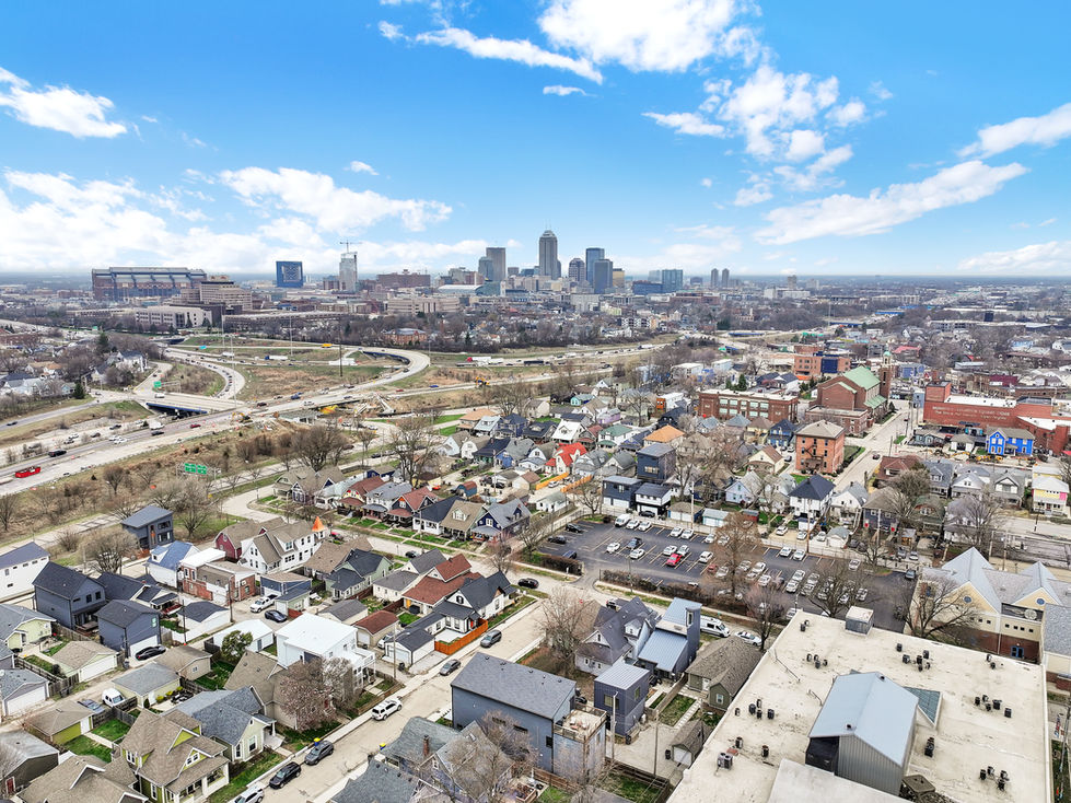 Drone shot showcasing proximity of Fountain Square home to Indianapolis skyline