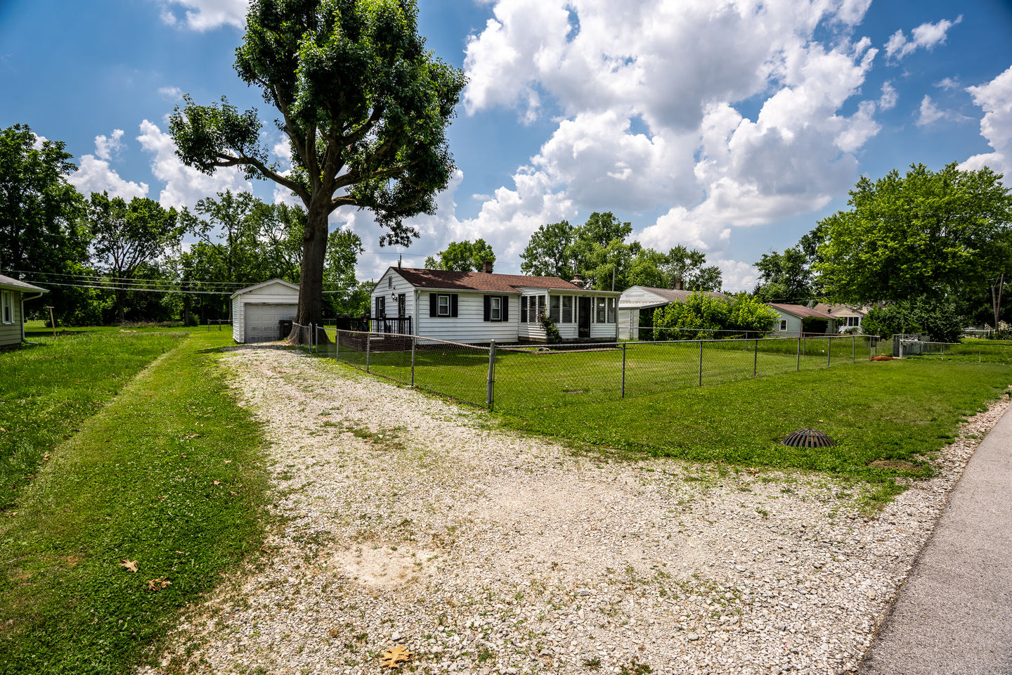 Close-up of front path and landscaping at 4639 Terrace Ave in Indianapolis.