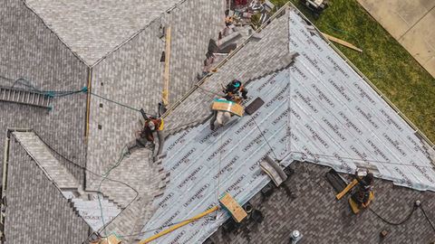 Crews from Allegiant Exteriors working on a roof replacement in Westfield, Indiana captured by Indy Drone Vision