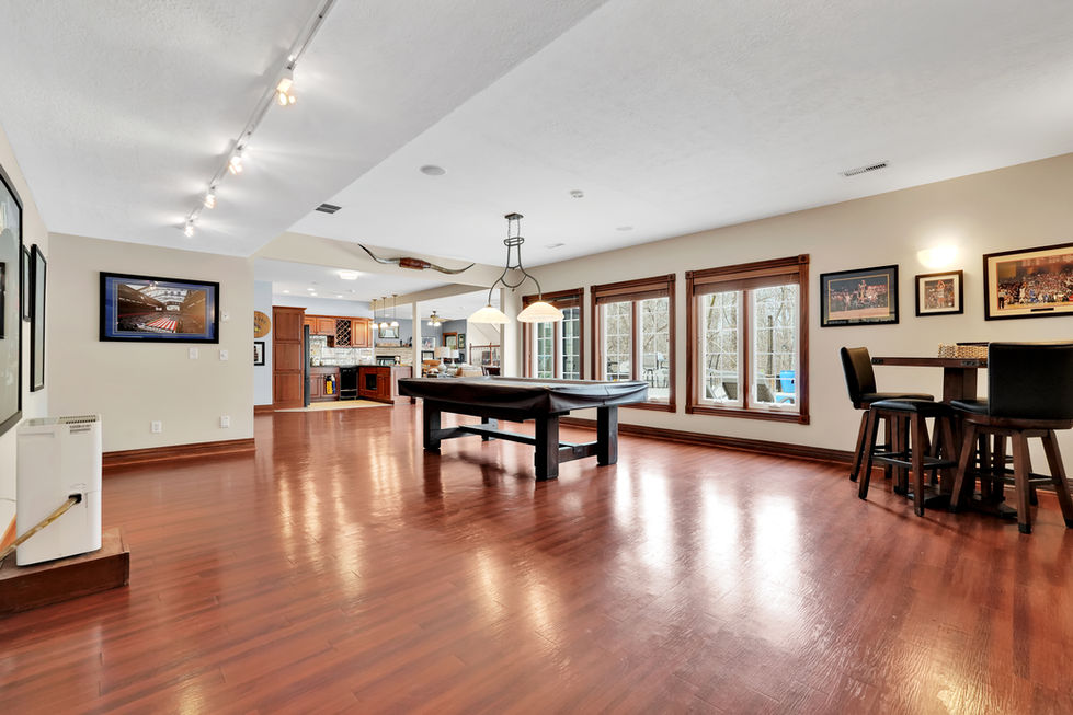 Basement living space with modern finishes in Indiana property