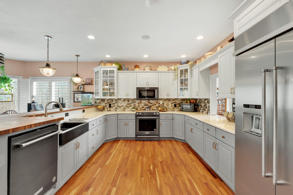 Open concept kitchen with natural light in Greencastle luxury home