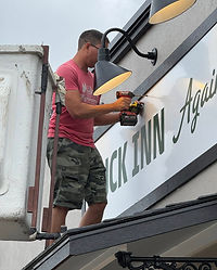 Duck Inn Again Sign Installation