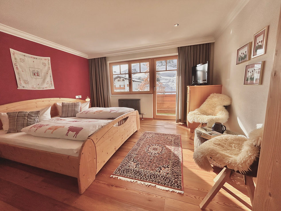 Haus Wallis - Doppelzimmer Hokus Pokus mit Blick auf die Dorfbahn Warth