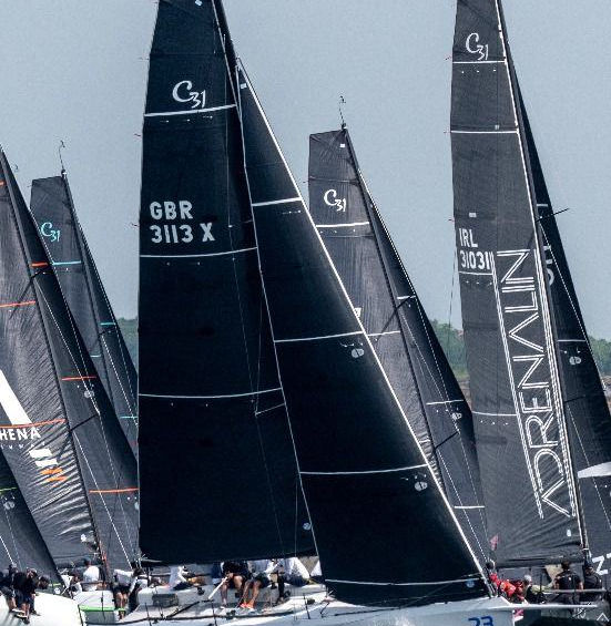 Cape 31 'Harlequin' hull 23 on the start line with the Cape 31 fleet