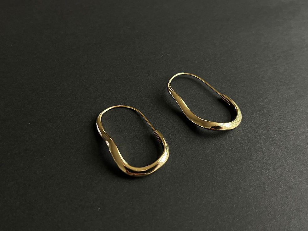 Thumbnail: Gold Wavy Twist Infinity Hoop Earrings