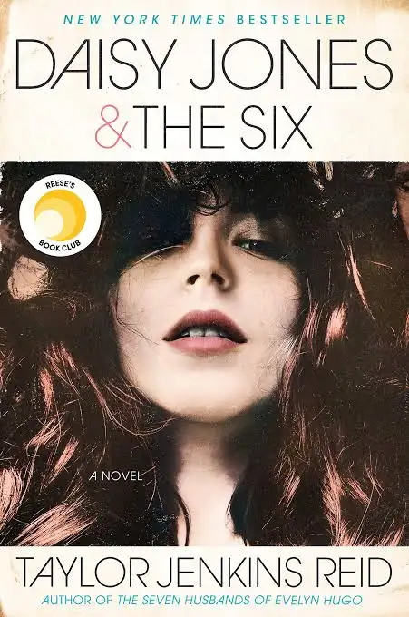 Cover showing young woman with curly hair with title above it and author below it.
