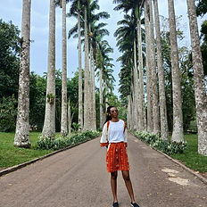 Woman standing in aburi Gardern