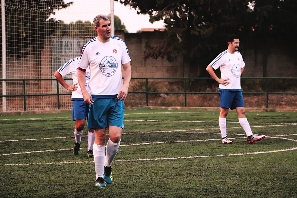 Grim dissapoinment amongst th back line in the moments following the winning goal