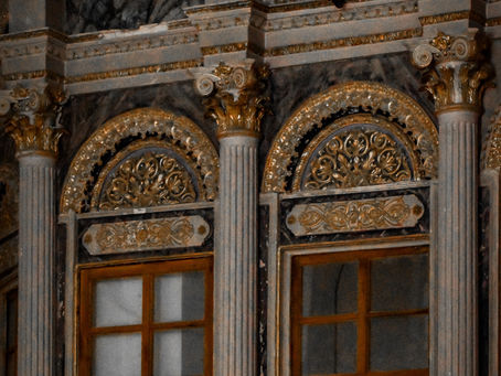 Gold leaf gilding on classical interior architecture featuring ornate decorative columns, luxury moldings, and handcrafted finishes by MIDAS TOUCH by Shehzad Khan, Mumbai.