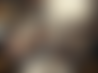 Buddies hang out in a cozy room, sipping on warm drinks and having deep chats.