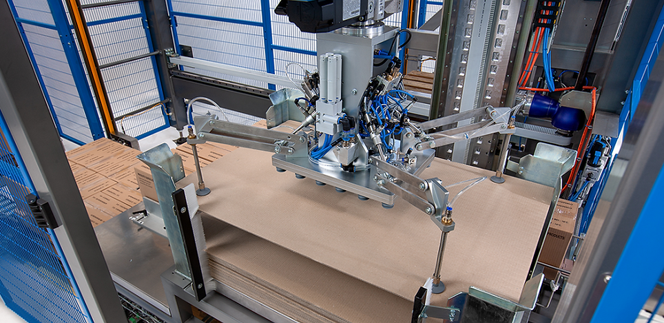 Sistema de agarre por vacío para paletización y manipulación automática de láminas separadoras