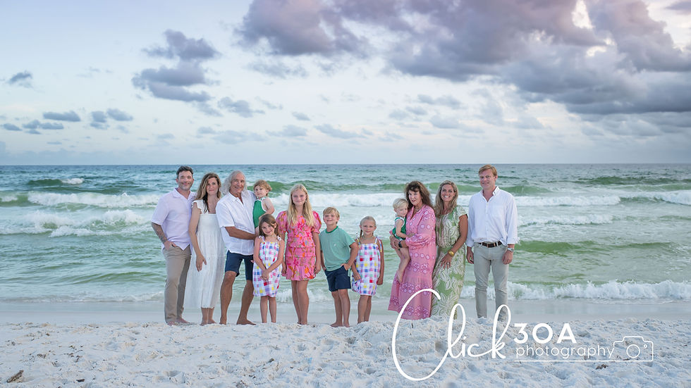 A beautiful family portrait capturing multiple generations on the beach at sunset, showcasing the beauty of family bonds.