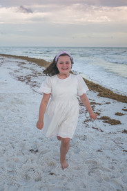Luxury beach family portrait perfect for canvas prints and where to buy heirloom art photography prints in 30A Florida.