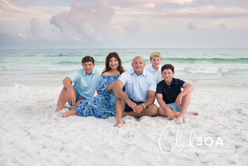Matching isn't necessary; coordinating shades of blue and seafoam green will create a stylish Seagrove Beach Photo Session.