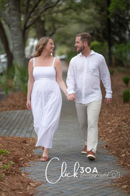 Expecting with hope and excitement, the couple shares a quiet moment in this 30A Maternity Portraits shot.