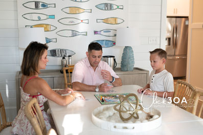 Capture the joy of family fun indoors! A 30A family portraits indoor session with a professional photographer guarantees beautiful images.