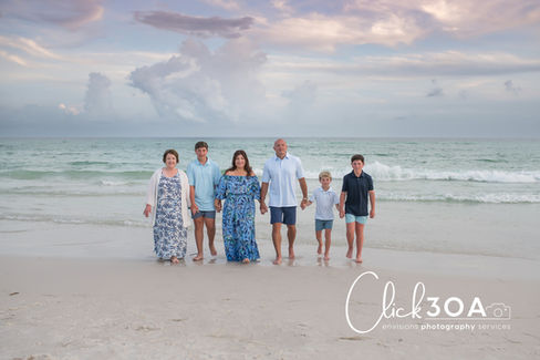 For your upcoming Seagrove Beach Photo Session, consider a palette of blues and seafoam green for a coastal vibe. Mom's long, flowy blue dress can set the tone for a beautiful Seagrove Beach Photo Session, complemented by the family's outfits. Dad can wear a navy blue shirt with khaki pants to coordinate perfectly for your Seagrove Beach Photo Session. Incorporate seafoam green accents through accessories like scarves or ties during your Seagrove Beach Photo Session. For the kids, consider shades of blue and seafoam green to create a cohesive look in your Seagrove Beach Photo Session. A Seagrove Beach Photo Session in blue and seafoam green creates a timeless and elegant look for family portraits. Think about the texture! Linen shirts and flowy dresses in blue and seafoam green will look amazing in your Seagrove Beach Photo Session. Accessorize sparingly; a pop of seafoam green in a necklace or bracelet can enhance your Seagrove Beach Photo Session. Navy, sky blue, and seafoam green blend effortlessly together for a stunning Seagrove Beach Photo Session. Make sure the outfits you choose for your Seagrove Beach Photo Session are comfortable and allow for movement. Avoid overly busy patterns; solid blues and seafoam green shades will work best for your Seagrove Beach Photo Session.