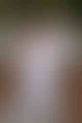 The couple’s silhouettes against the sunset create a dramatic 30A Maternity Portraits scene.