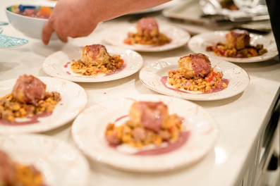 A Pensacola Photographer from Clean Camera Photography crafts elegant family photos on the sands of Casino Beach.