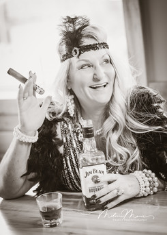 Posing against the bar’s rich wooden backdrop, the group showcases their stylish outfits and a collection of retro-inspired drinks, highlighting the fusion of fashion and fun.