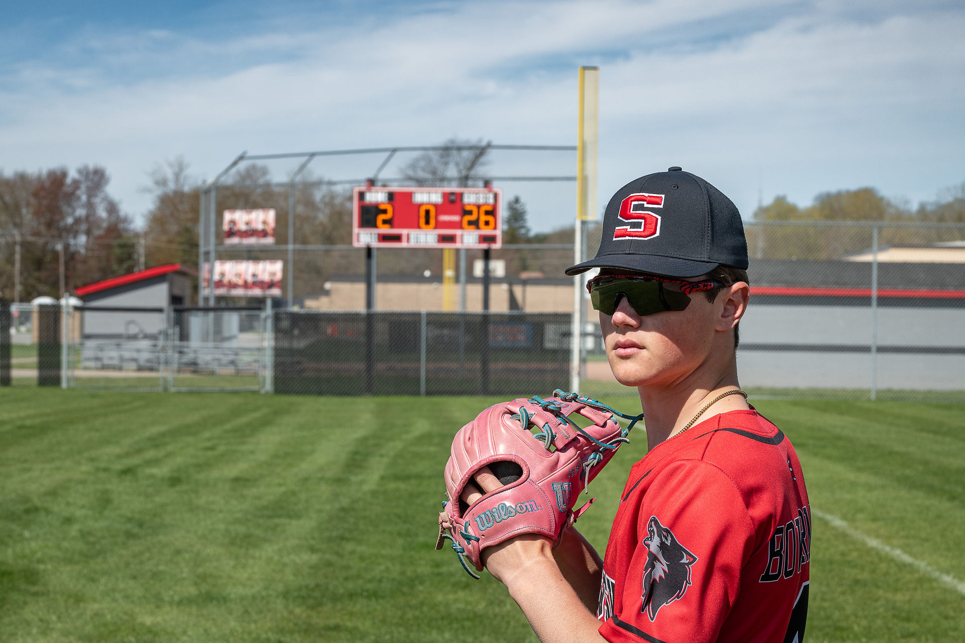 We had a blast creating these baseball-themed Michigan Senior Portraits.