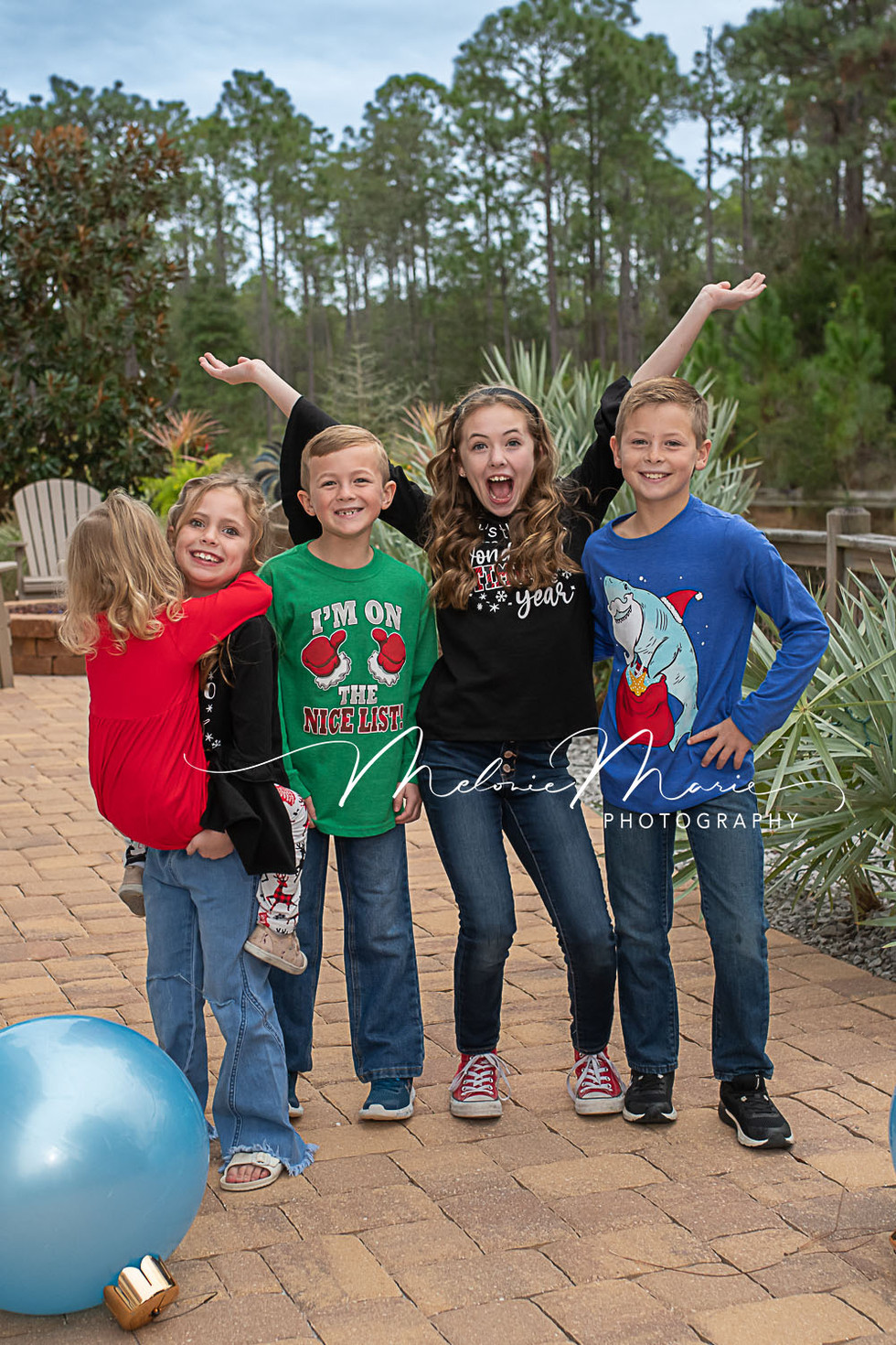 Christmas Mini Sessions in Seaside Florida with 30A Photography and family in ugly christmas sweaters