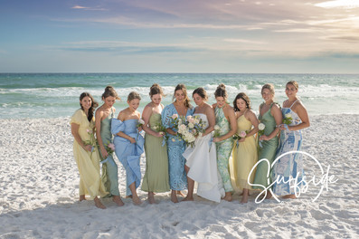 Myrtle Beach Photographer directing a sunrise vs sunset golden hour photo session among resort guests.