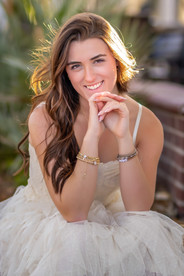 Cultivating poise and self-assurance during a styled session by Envisions by Click 30A for Senior Portraits in Destin.