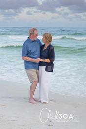 We can help you design a custom photo album showcasing your family's joy, as seen in the Golden Hour light, thanks to your 30A Photographer.