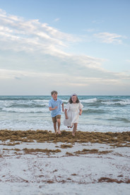 Luxury family beach portrait showing where to buy heirloom art photography prints in 30A Florida.