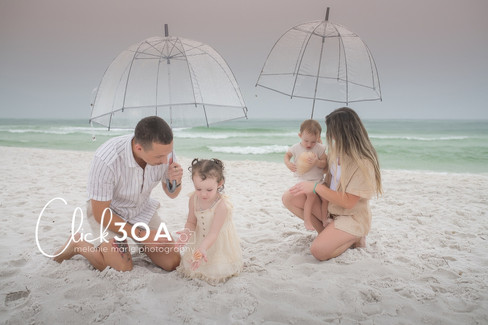 30A Beach Mini Sessions with family of 4 in the rain at Seaside Florida