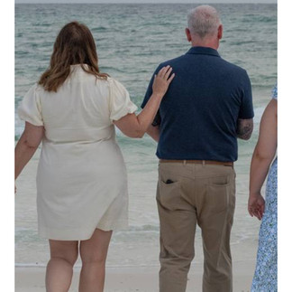 Family portraits in Inlet Beach became the perfect way to share big news in a beautiful, meaningful setting.