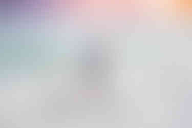 Closeup portrait of smiling faces during a sunrise vs sunset golden hour photo session in Myrtle Beach.