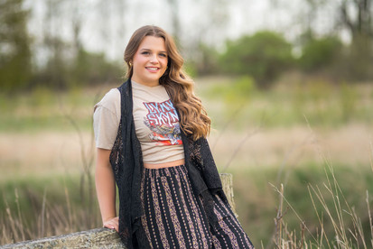 Melonie Marie has several quick take mini sessions available the last week of September for senior portraits in Michigan.