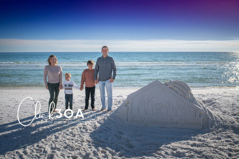 holiday card photo shoot at Seagrove Beach with Santa Claus