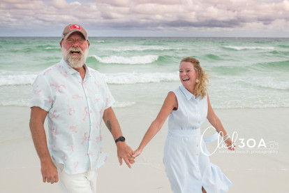 Couple sharing a sweet moment, beautifully framed by Click 30A. Need to know where to find couples photography in Santa Rosa Beach? Click 30A is your go-to!