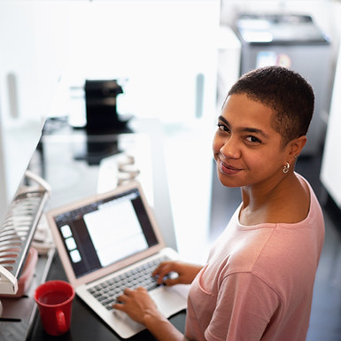 person learning AI on laptop at home