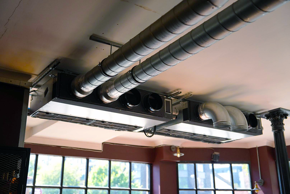 Complete and finished installation of panasonic unit in the exterior wall of bedford tavern