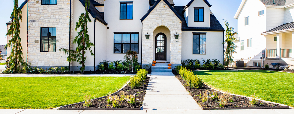 fully designed and landscaped front yard