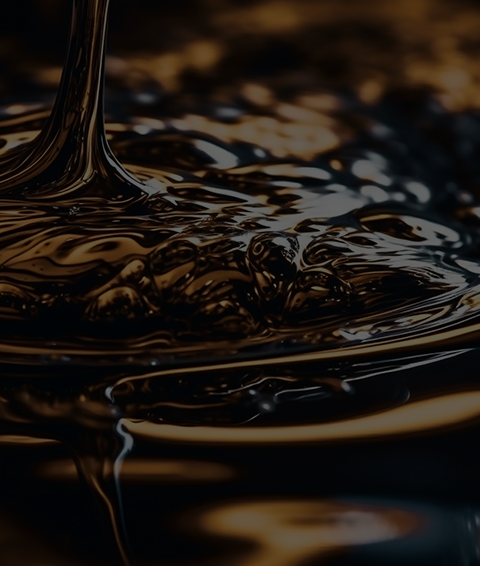 glass-wine-is-poured-into-black-surface.png
