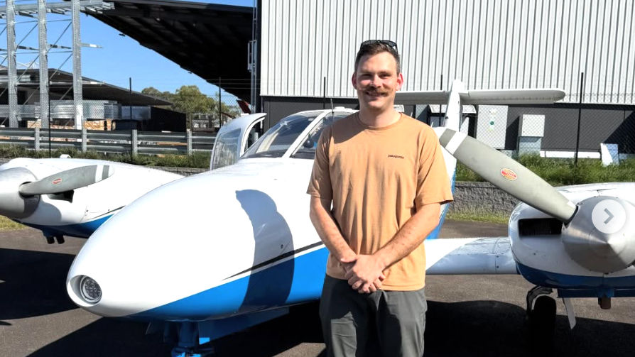 SFT Student Jack next to aircraft VH-PIE