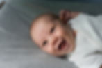 Smiling baby at their newborn session in vermont