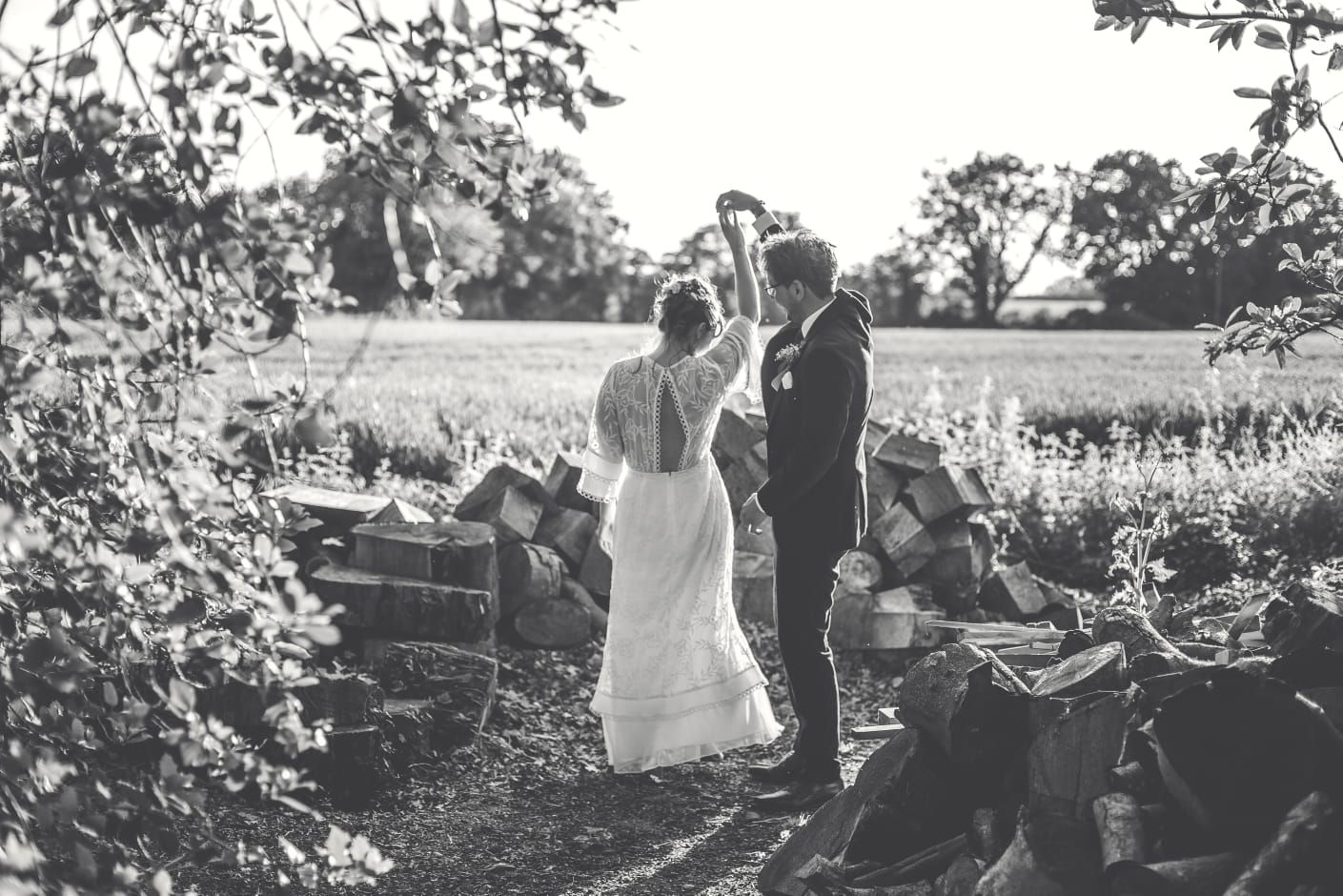 Bride and Groom dancing in the woods