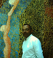 GRATALOUP - 1975 - GRATALOUP IN HIS 37 H.B STUDIO IN FRONT OF ONE THE WORK OF THE SERIES