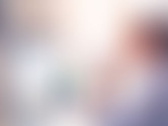 A woman at a desk, working on a project Gantt chart