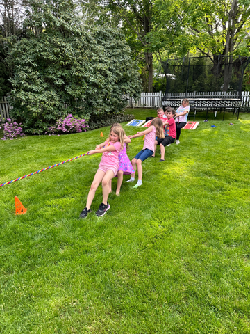 Children playing Tug of War.