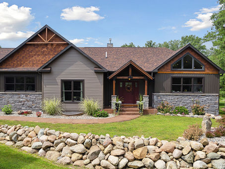 Modular one story home. Brown with wood finishes.
