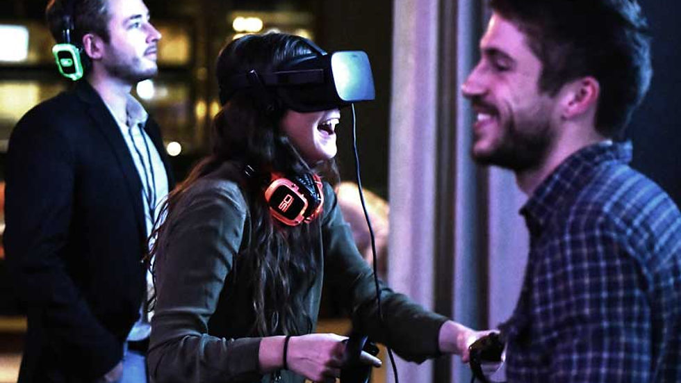 Virtual Reality Rentals, a female wearing virtual reality goggles at an event