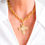Thumbnail: Susan Shaw Solid Cross Necklace