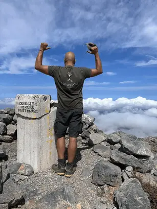 Dimitris with NatureSoul Adventures on the summit of Dikti mountain. This we call mountainering